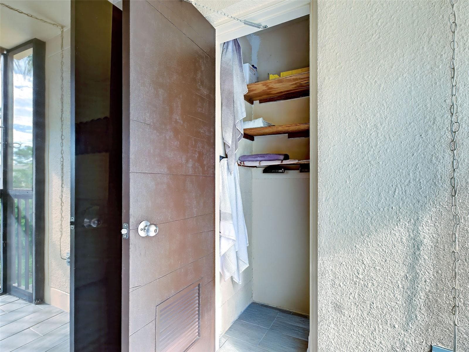 STORAGE ROOM LOCATED ON LANAI - 3006 CARING WAY #310, PORT CHARLOTTE