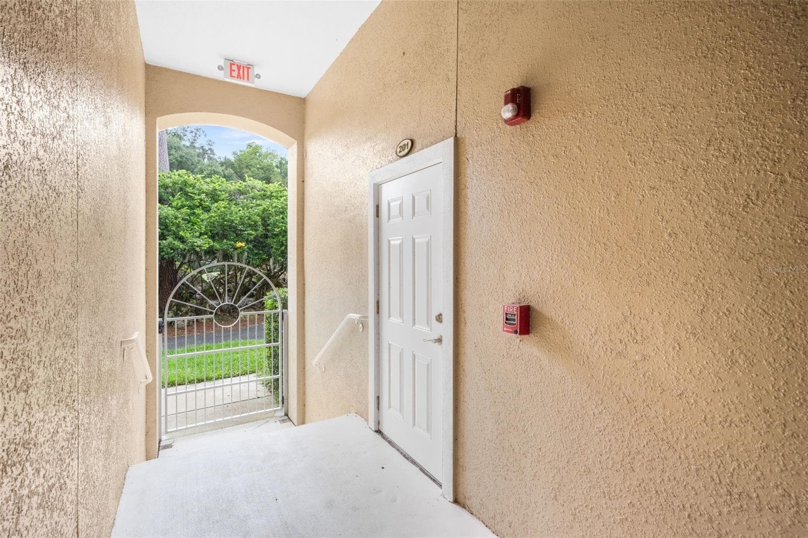 Back door to garage, under cover - 4715 SW 91ST DR #201, GAINESVILLE