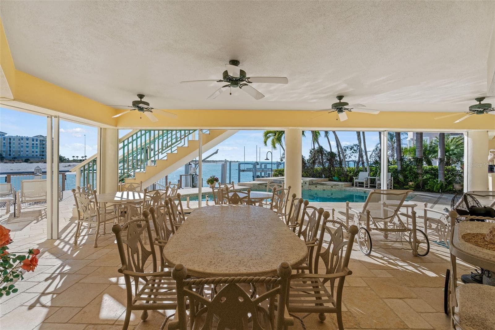 Large Covered Lanai has Hurricane Panels to protect outdoor furniture. - 964 MONTE CRISTO BLVD, TIERRA VERDE