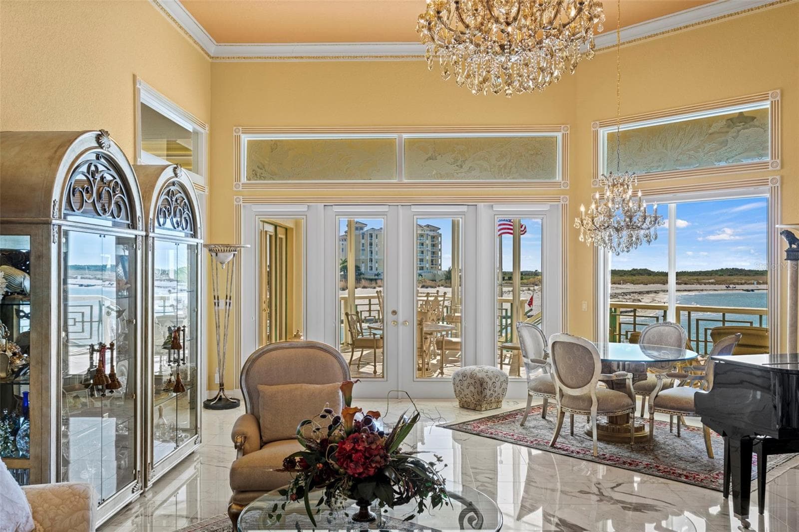 Formal Living Room with Marble Floors and French Doors to the Upper Level Lanai - 964 MONTE CRISTO BLVD, TIERRA VERDE