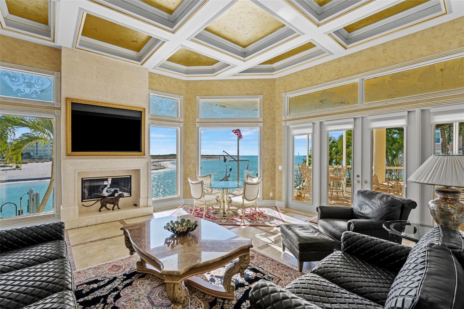 Great room with Coffered Ceilings, Fireplace and Water Views! - 964 MONTE CRISTO BLVD, TIERRA VERDE
