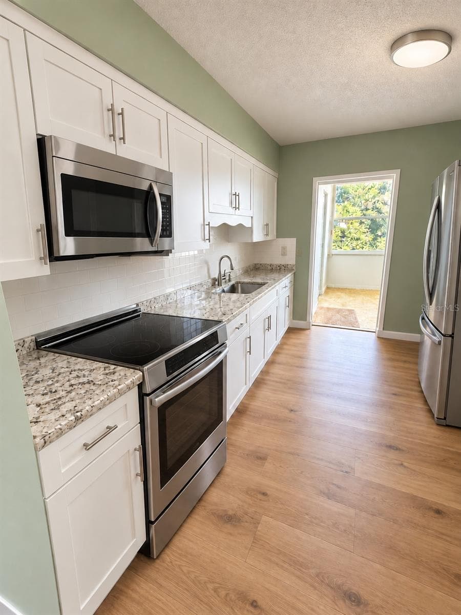 Kitchen Staged & Remodeled - 5725 12TH AVE N #306D, ST PETERSBURG