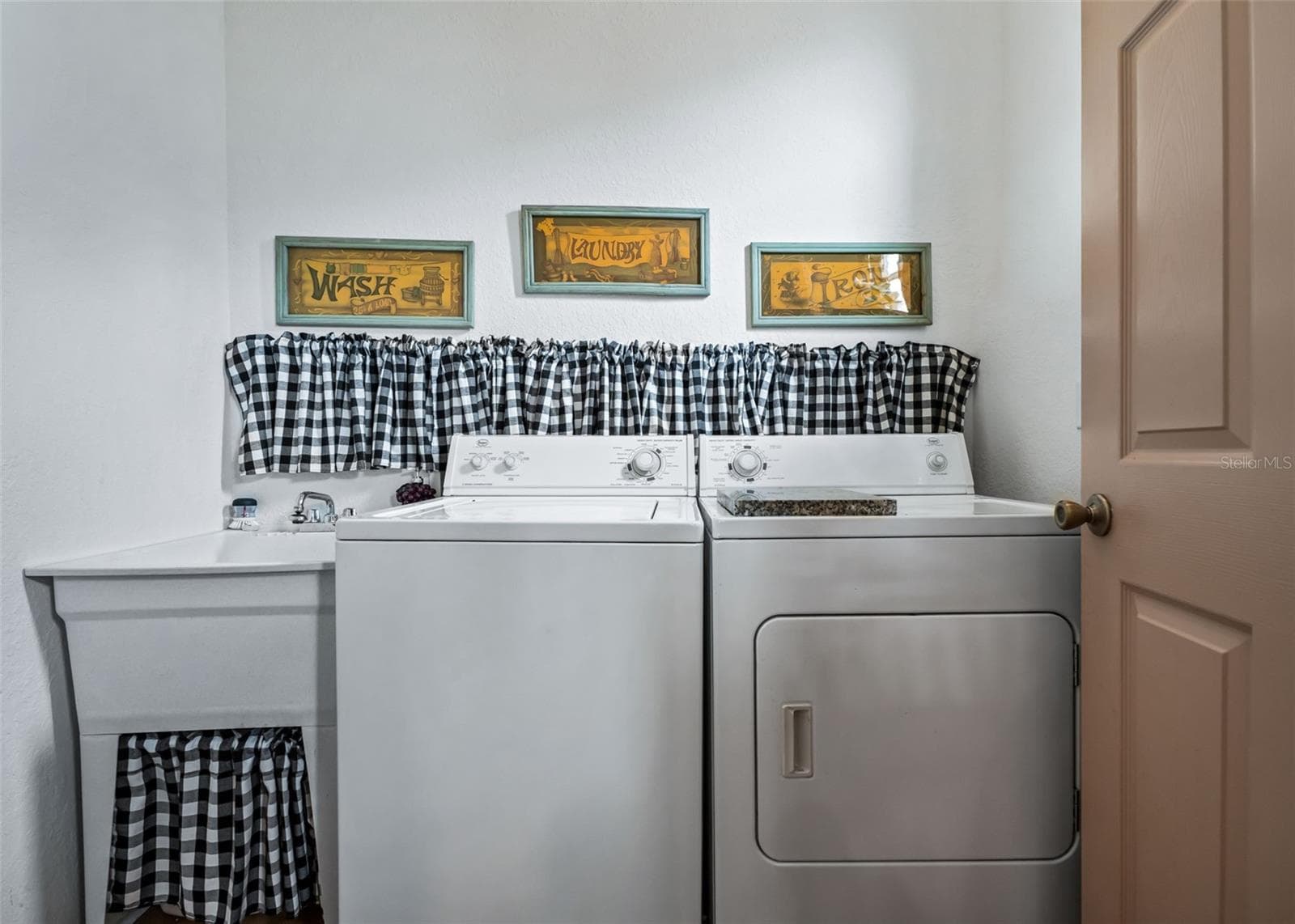 Inside Laundry Rm w/Utility sink - 17021 SE 115TH TERRACE RD, SUMMERFIELD