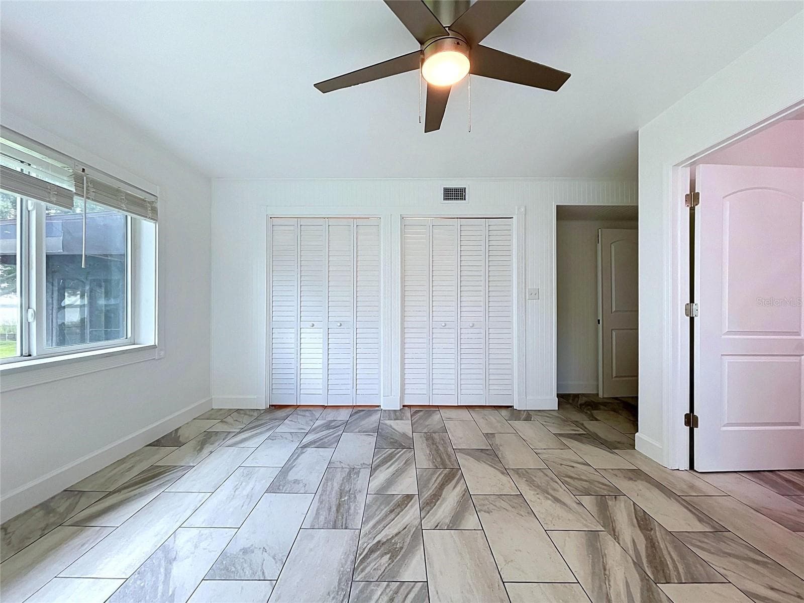 Additional bedroom 1 view with windows - 1348 EDGEWATER BEACH DR, LAKELAND