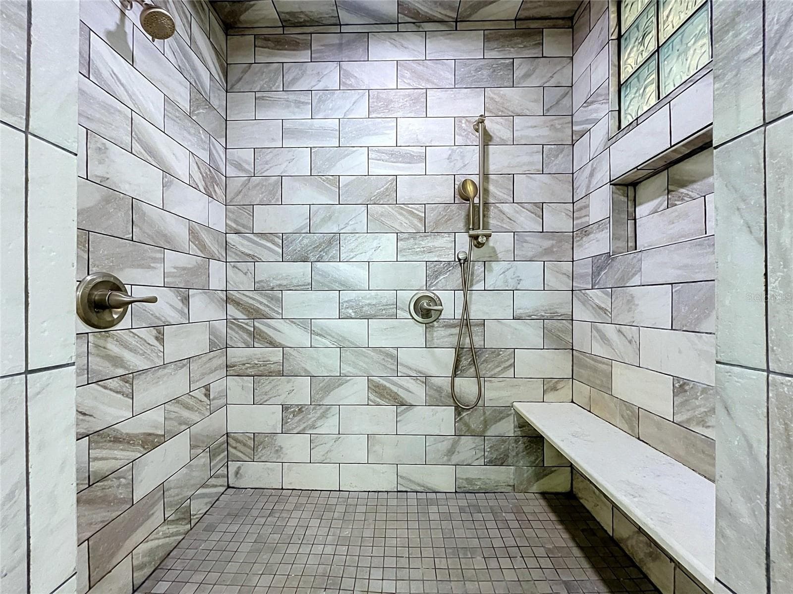 Bathroom 1 walk-in shower with tiled walls - 1348 EDGEWATER BEACH DR, LAKELAND