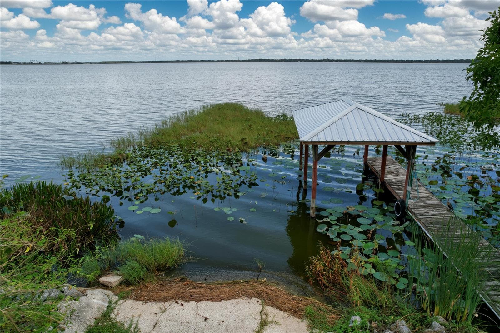 Lakefront view and dock and ramp - 1348 EDGEWATER BEACH DR, LAKELAND
