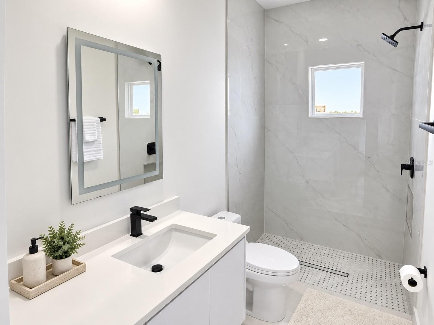 Additional bathroom with a vanity and walk-in shower. - 3126 BELLEVILLE TER, NORTH PORT