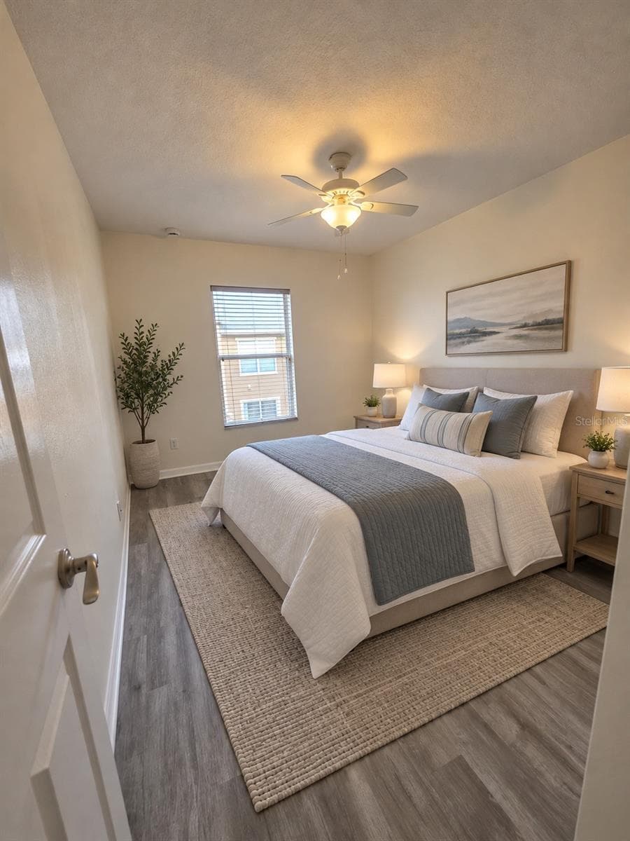 Bedroom 2 virtually stage - 4231 TRIDENT PT, OVIEDO