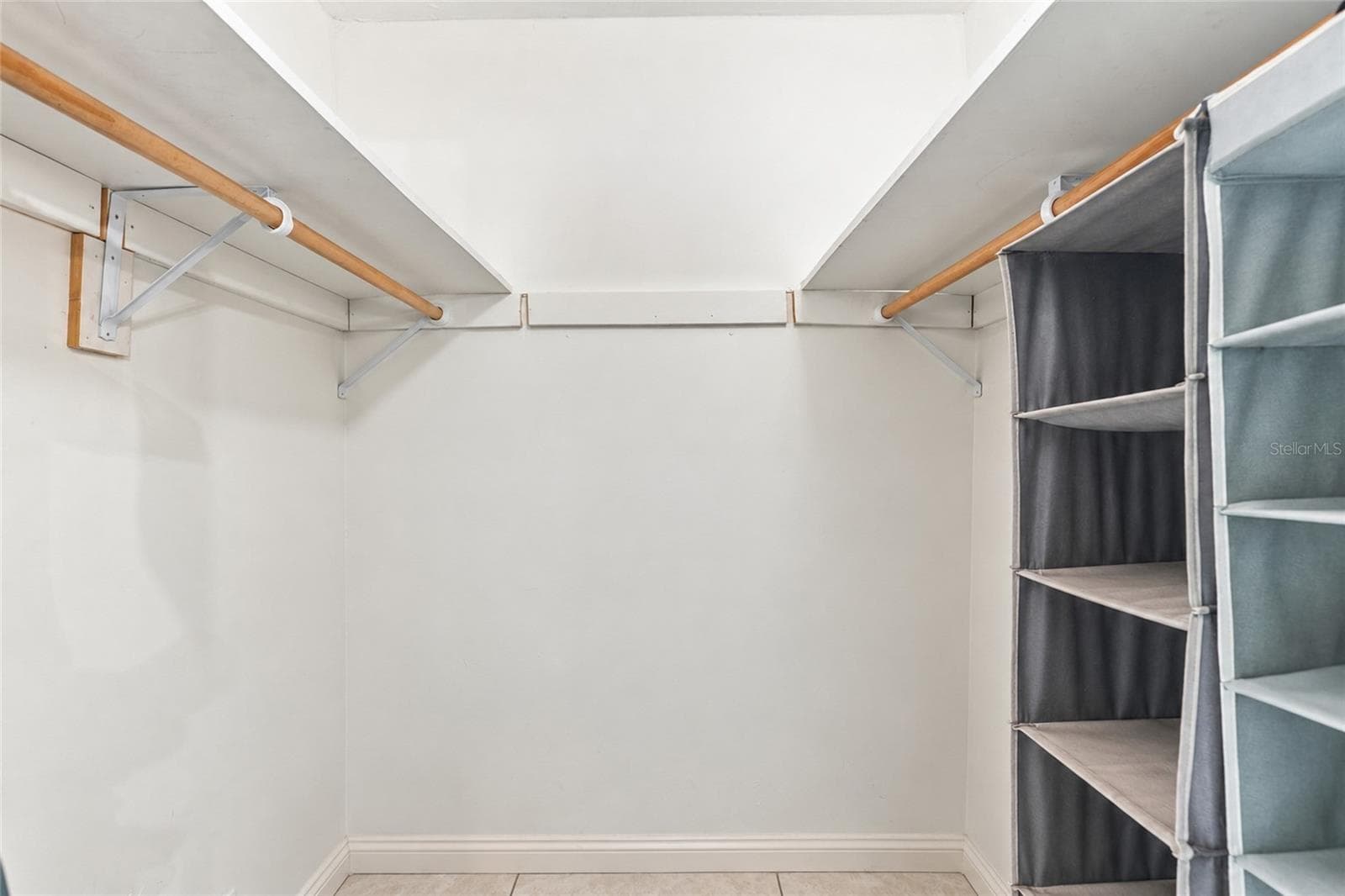 Spacious Walk-In Closet in the Primary Bedroom for Convenient Storage - 2629 JAMAICA ST #1, SARASOTA