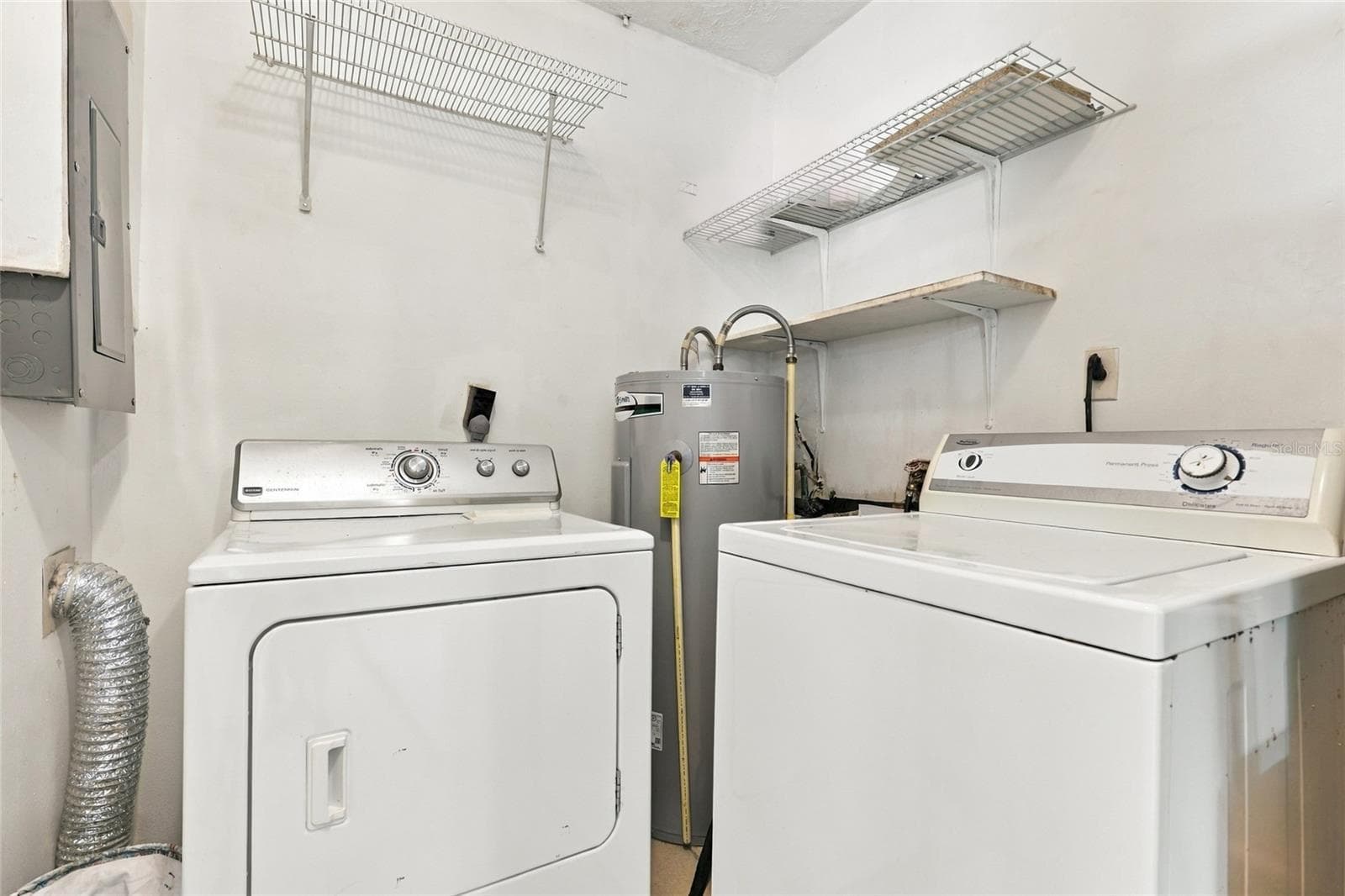 Convenient Indoor Laundry Room with Dedicated Space for Everyday Essentials - 2629 JAMAICA ST #1, SARASOTA