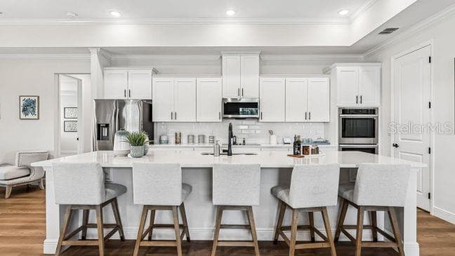 Model home - actual features may vary. - 136 LINDER DR, HOMOSASSA