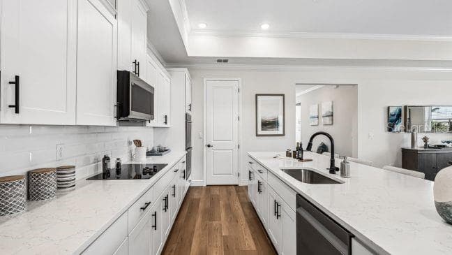Model home - actual features may vary. - 136 LINDER DR, HOMOSASSA