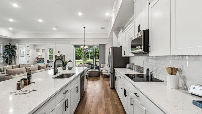 Model home - actual features may vary. - 136 LINDER DR, HOMOSASSA