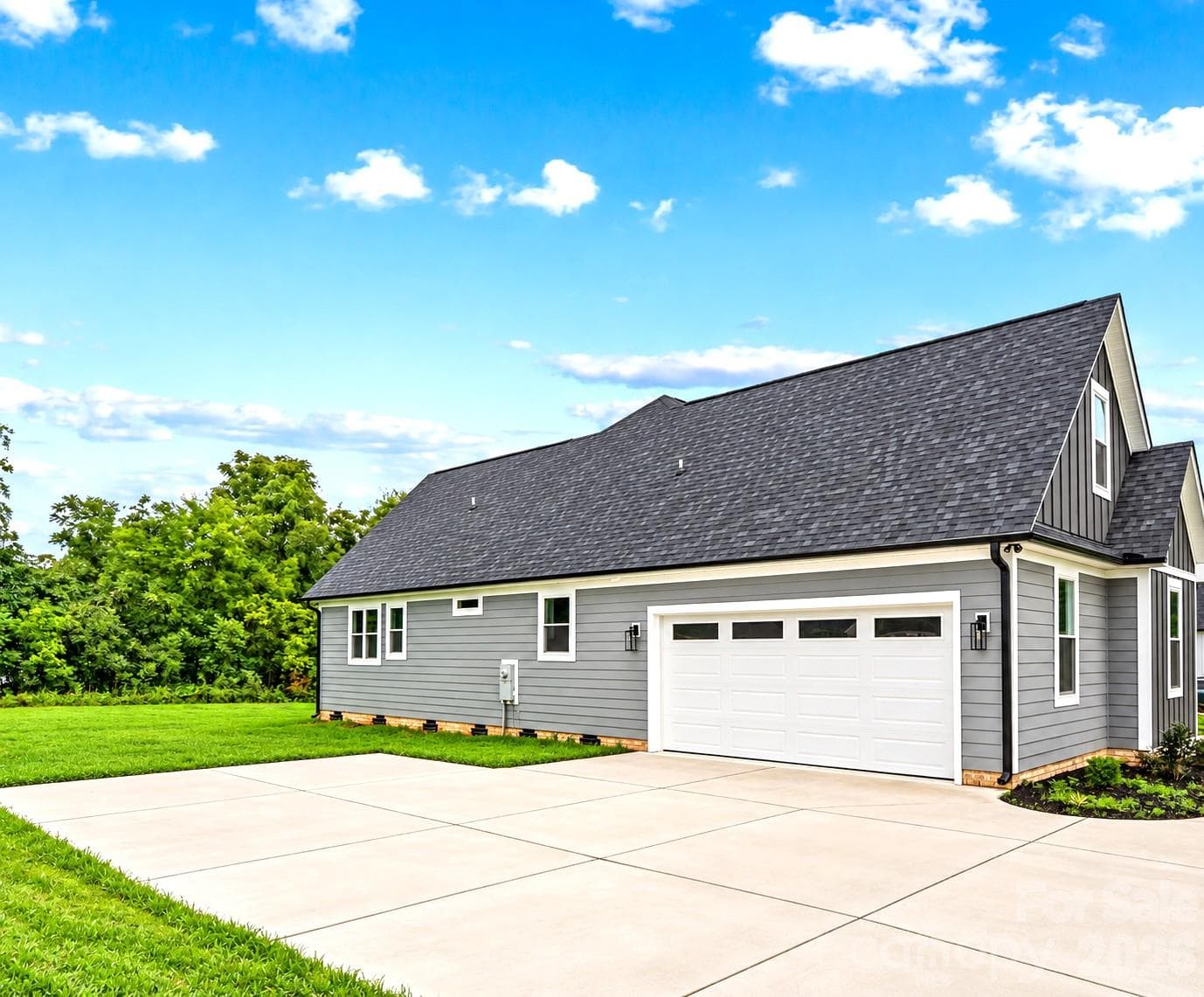 Two car Garage plus large driveway & extra concrete for turn around. (Park many cars.) - 1205 Coppergate Drive, Salisbury