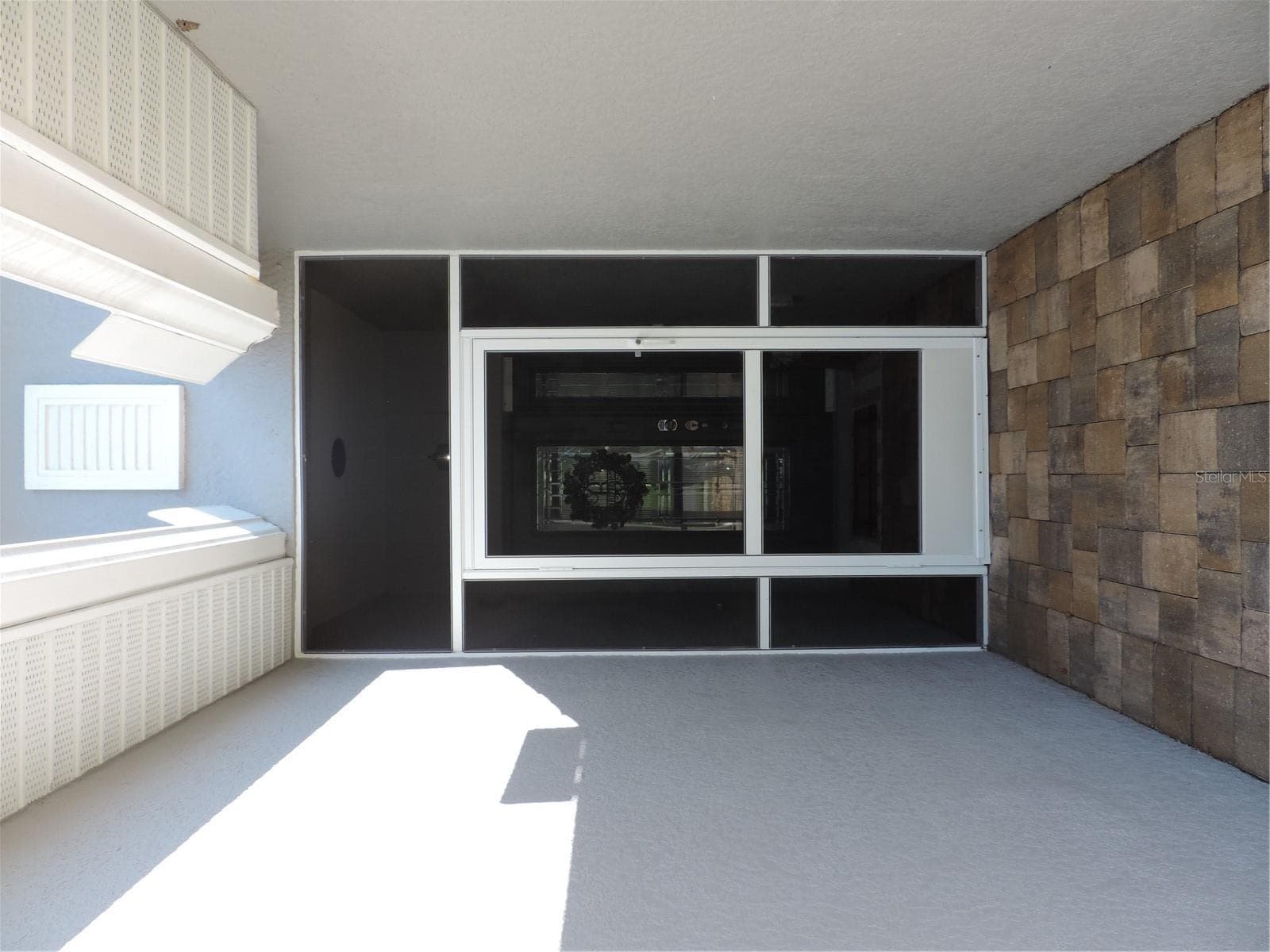 Screened front door entry - 5070 LAYTON DR, VENICE