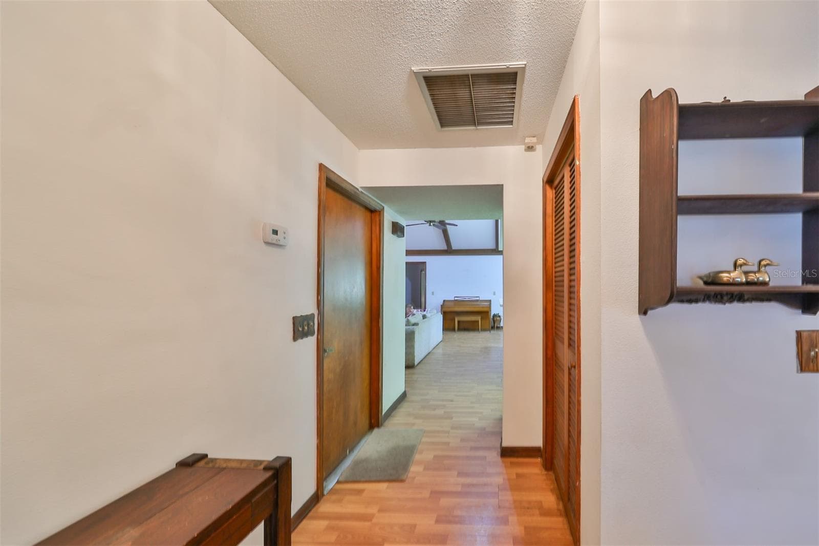 As you enter a foyer welcomes you. Family room is straight ahead and the separate living room is to the right. - 2609 MANOR OAK DR, VALRICO