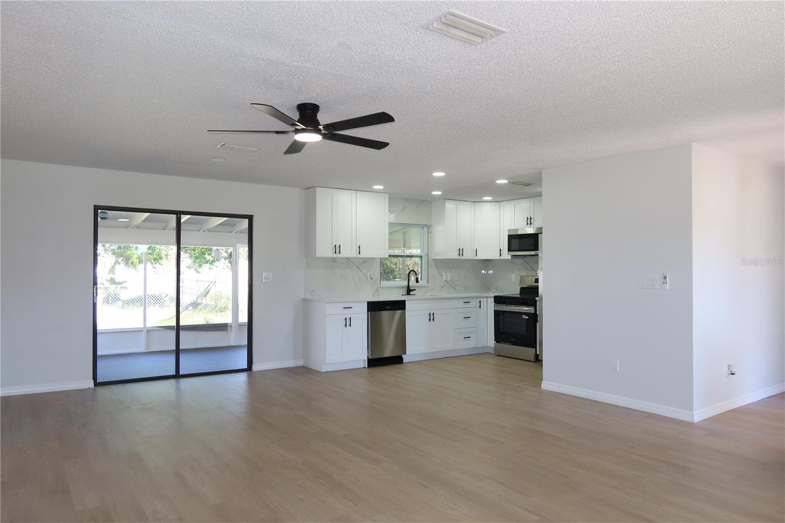 Single Family Residence at 9353 CHASE ST, SPRING HILL, photo 3 of 32