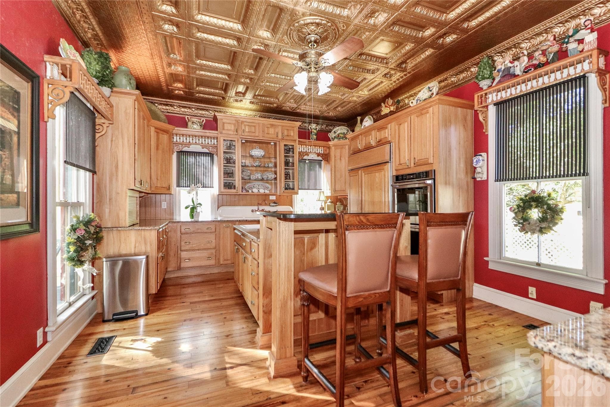 Kitchen - Stamped Tin Ceiling, Solid Surface Countertops, Island with Prep Sink & Gas Stove Top - 235 Walnut Street, Statesville
