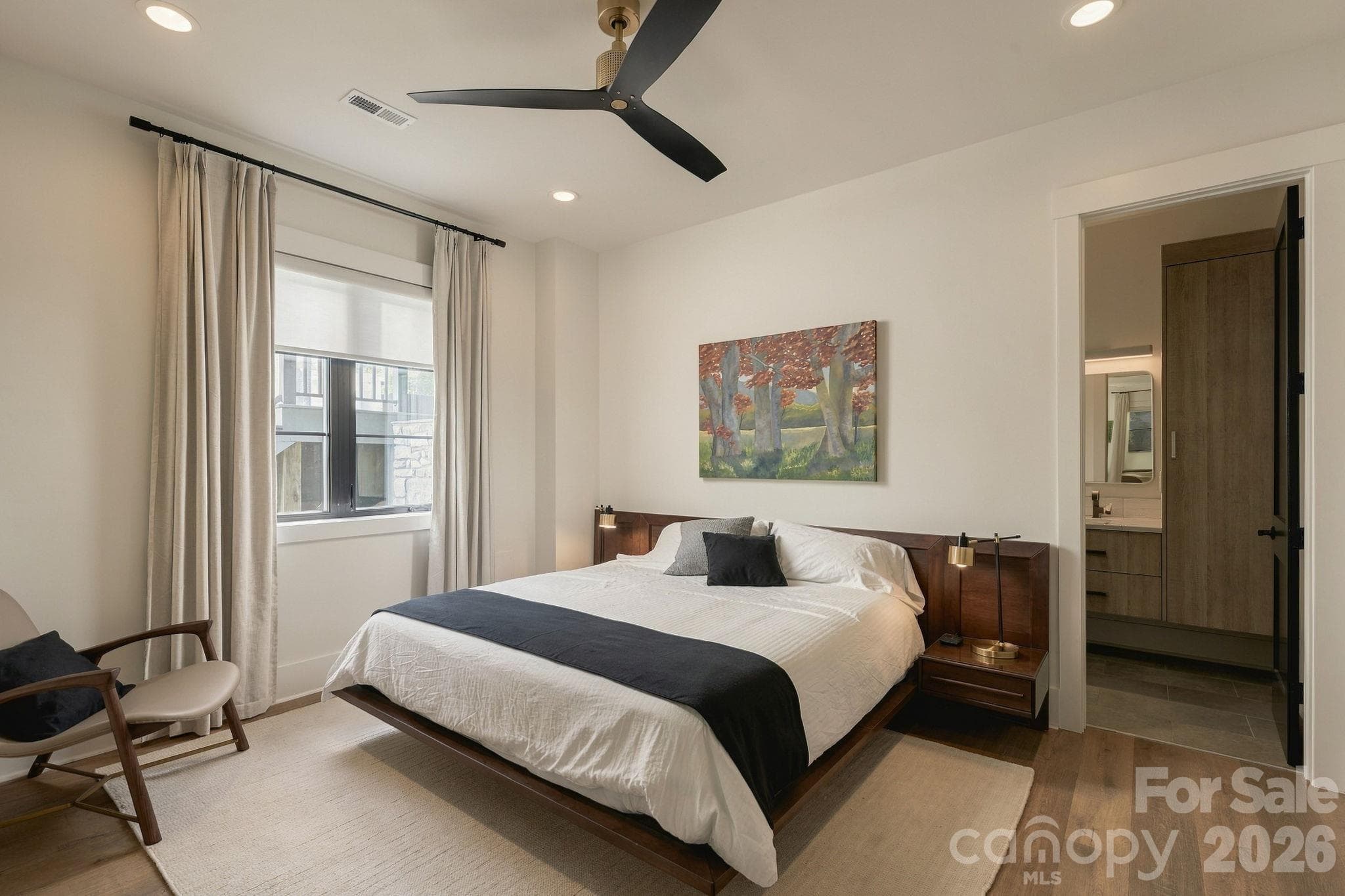 Primary Bedroom on the lower level, complete with ensuite bathroom - 298 Marietta Road, Mooresville