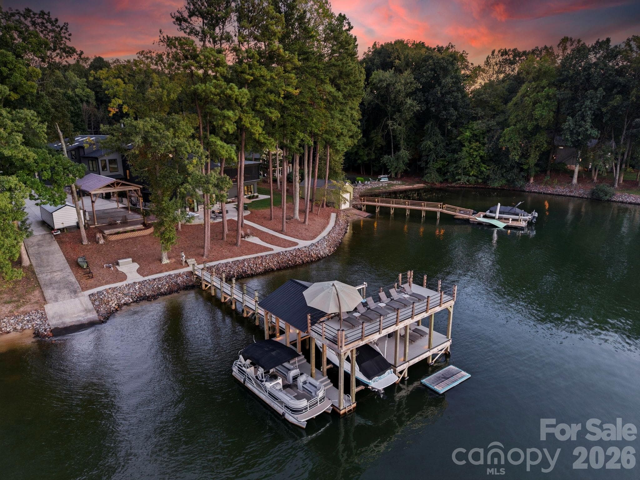 Extra large double decker dock, plus sidewalks grandfathered in along water's edge no longer able to be built - 298 Marietta Road, Mooresville