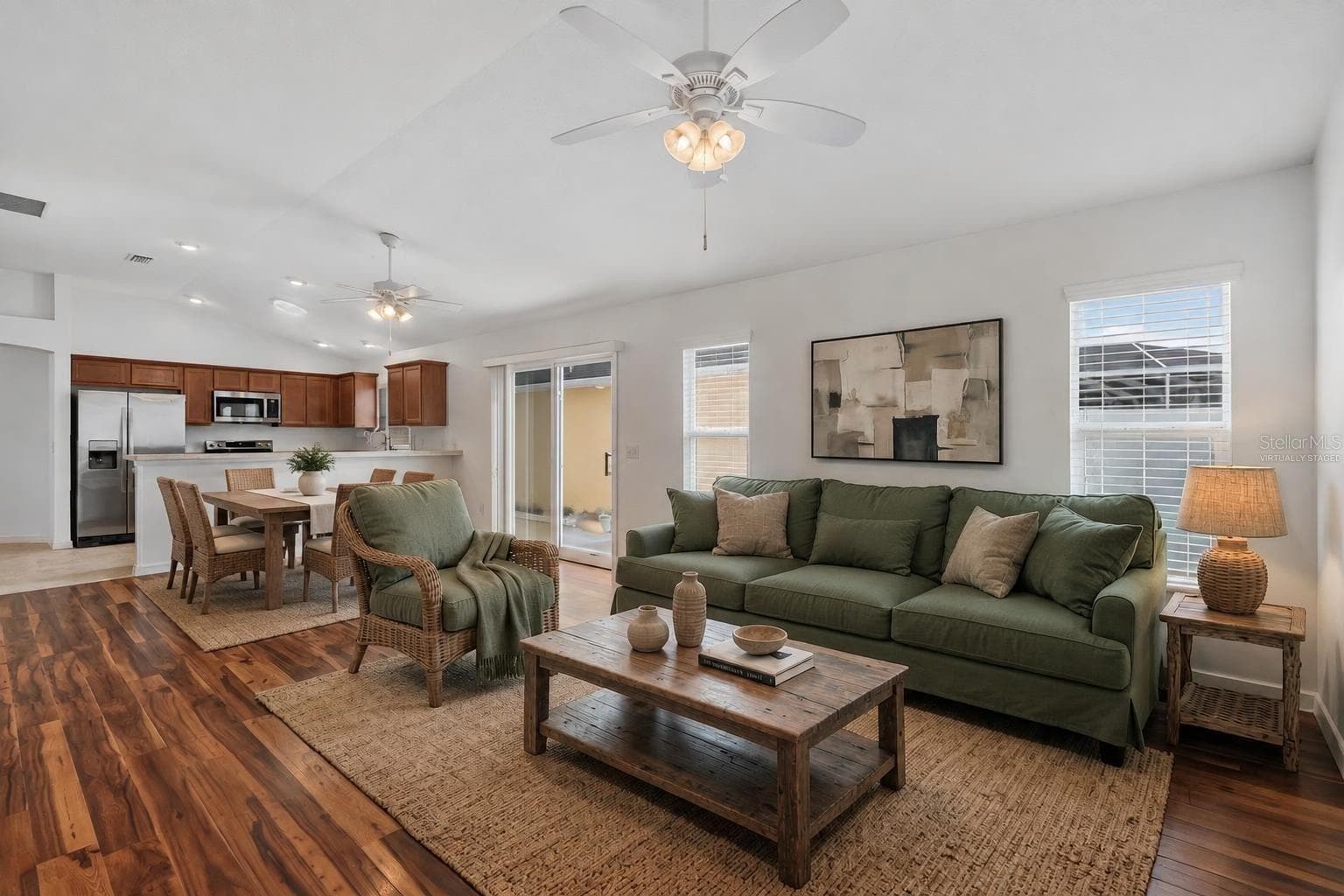 Living, Dining, and Kitchen-Virtually Staged - 3056 EASTWOOD TER, THE VILLAGES