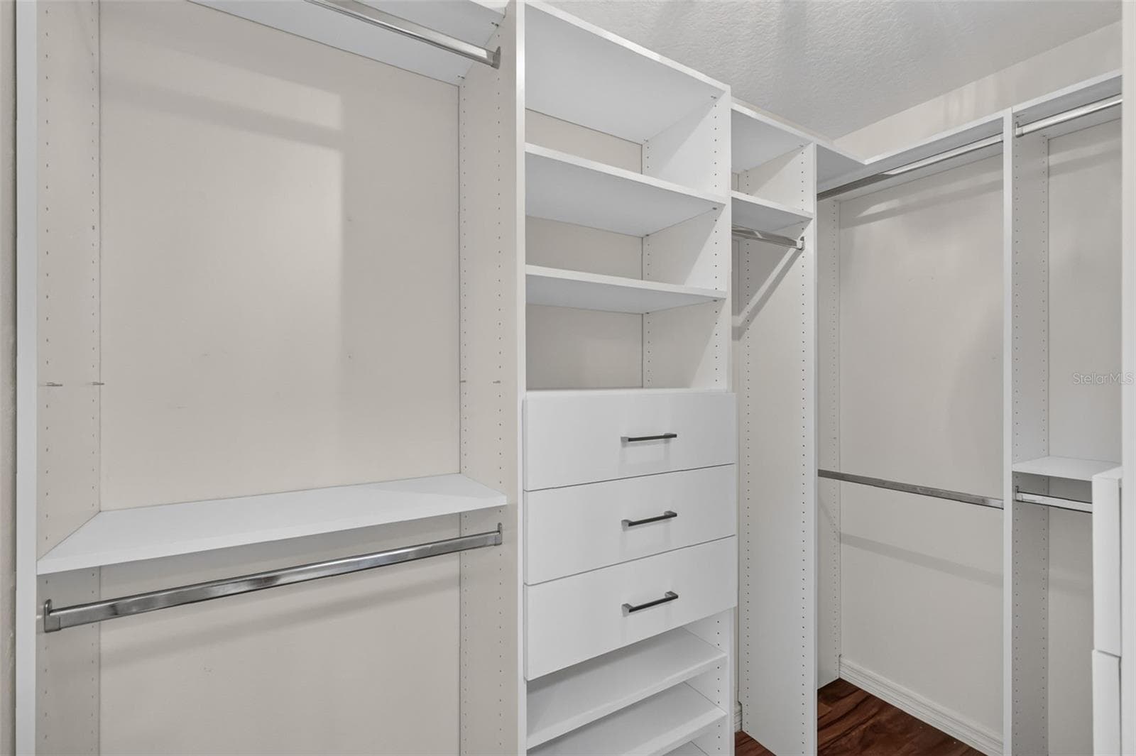 Primary Bedroom Customized Walk-In Closet - 3056 EASTWOOD TER, THE VILLAGES