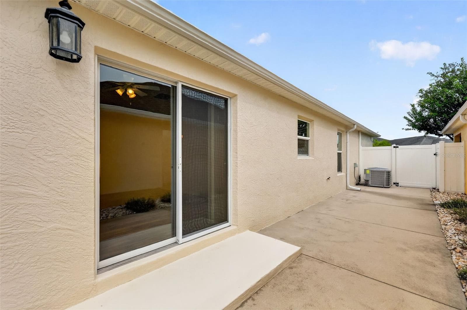 Side Courtyard - 3056 EASTWOOD TER, THE VILLAGES