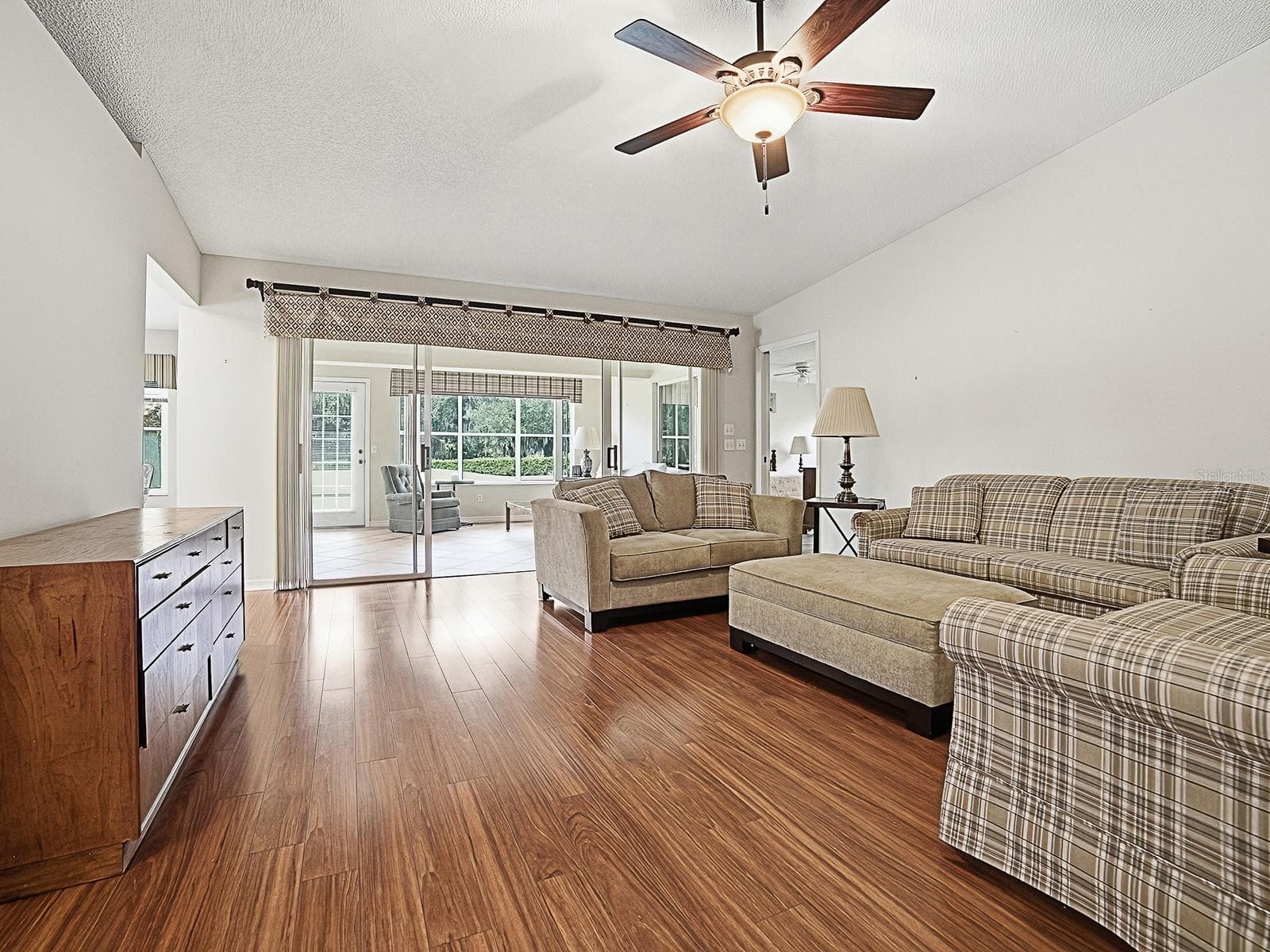 VIEW FROM LIVING AREA TO LANAI - 32543 OAK PARK DR, LEESBURG