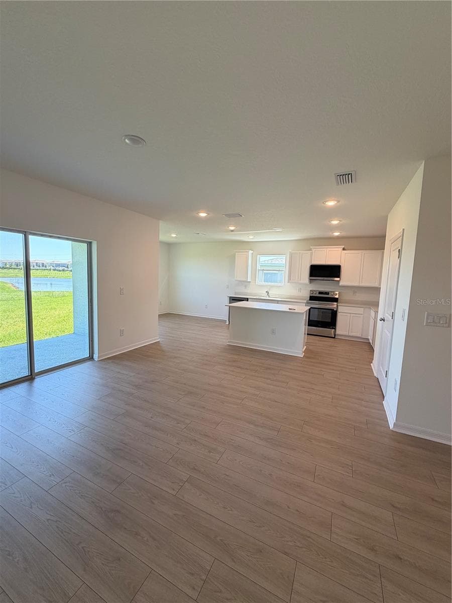 Main living/kitchen - 12922 RED DEER PL, PARRISH