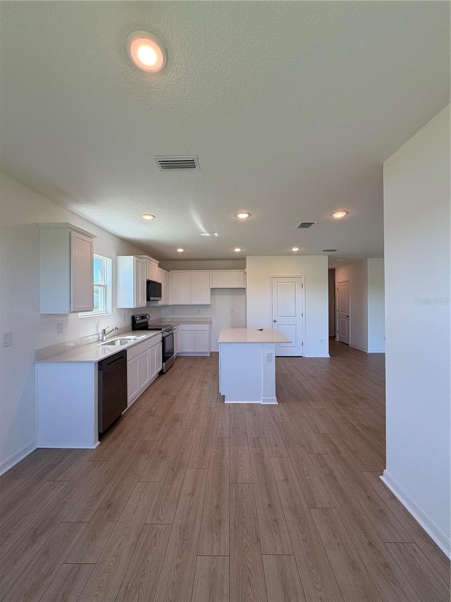 Dining Room and Kitchen - 12922 RED DEER PL, PARRISH