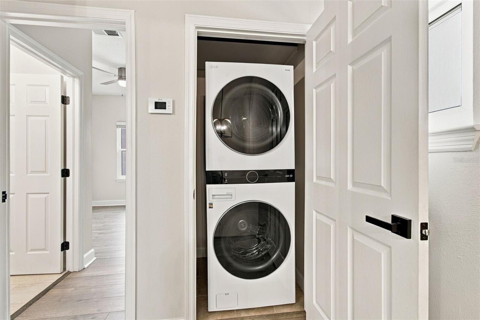 Upstairs Laundry closet - 5303 POINT PLEASANT LN, TAMPA