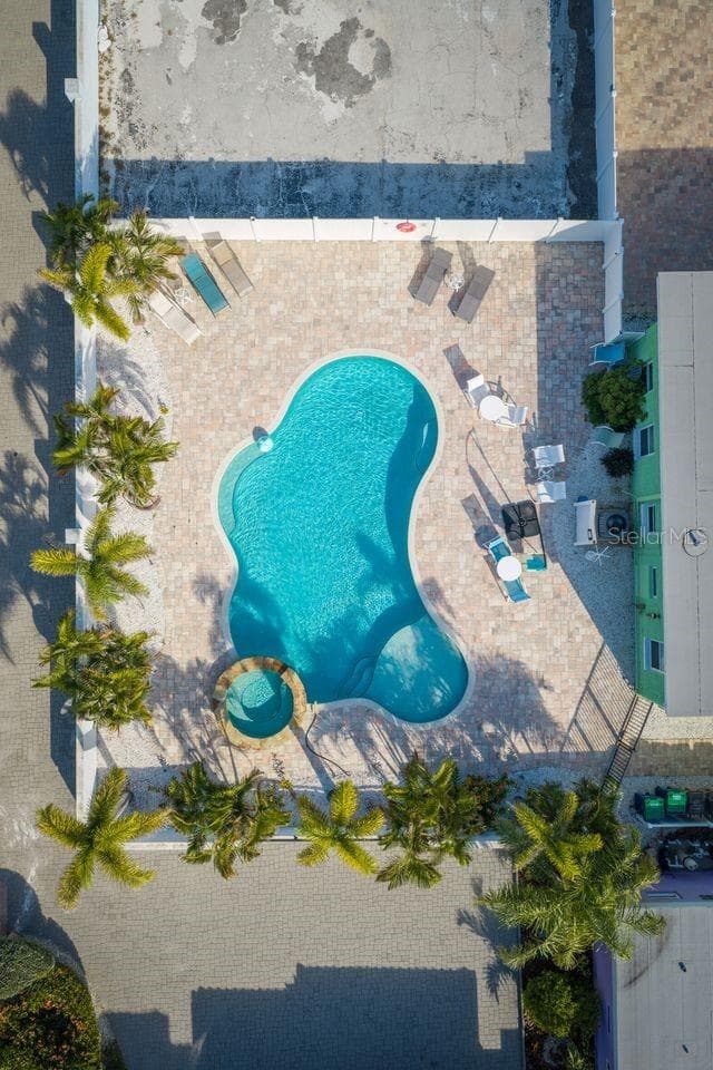 Pool has abundant deck area. - 1512 GULF BLVD, INDIAN ROCKS BEACH