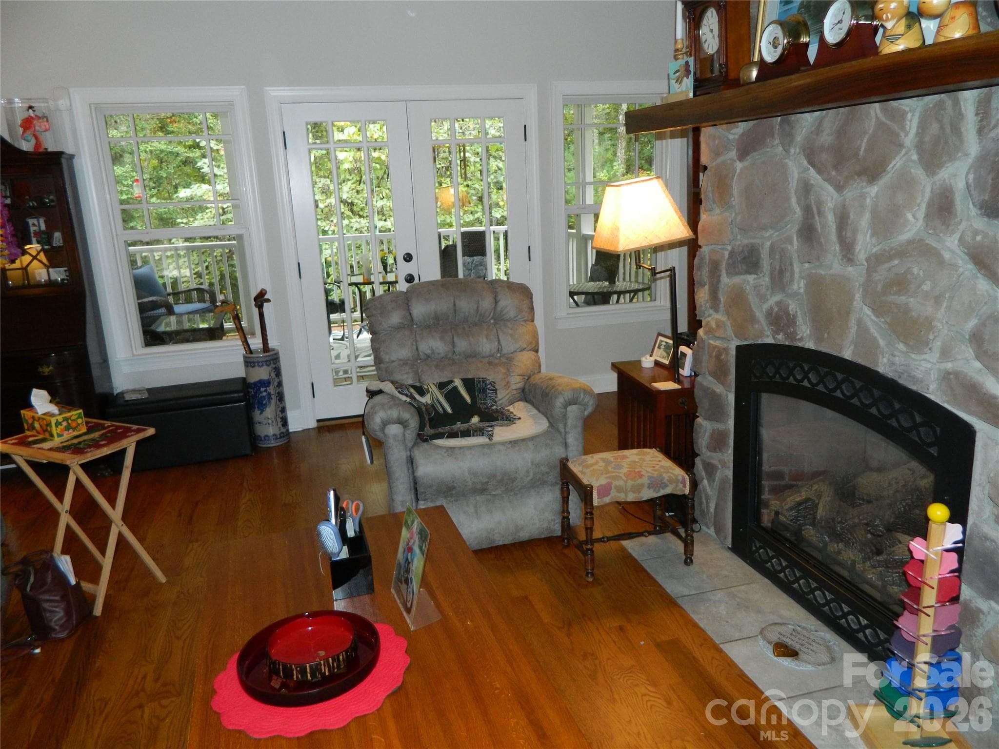 Living Room With Entrance to Covered Deck In The Background - 4307 Partridge Court SE, Lenoir