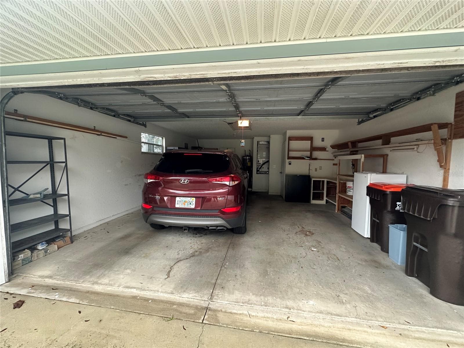 2 car garage with pull down stairs to attic - 10816 SW 83RD AVE, OCALA