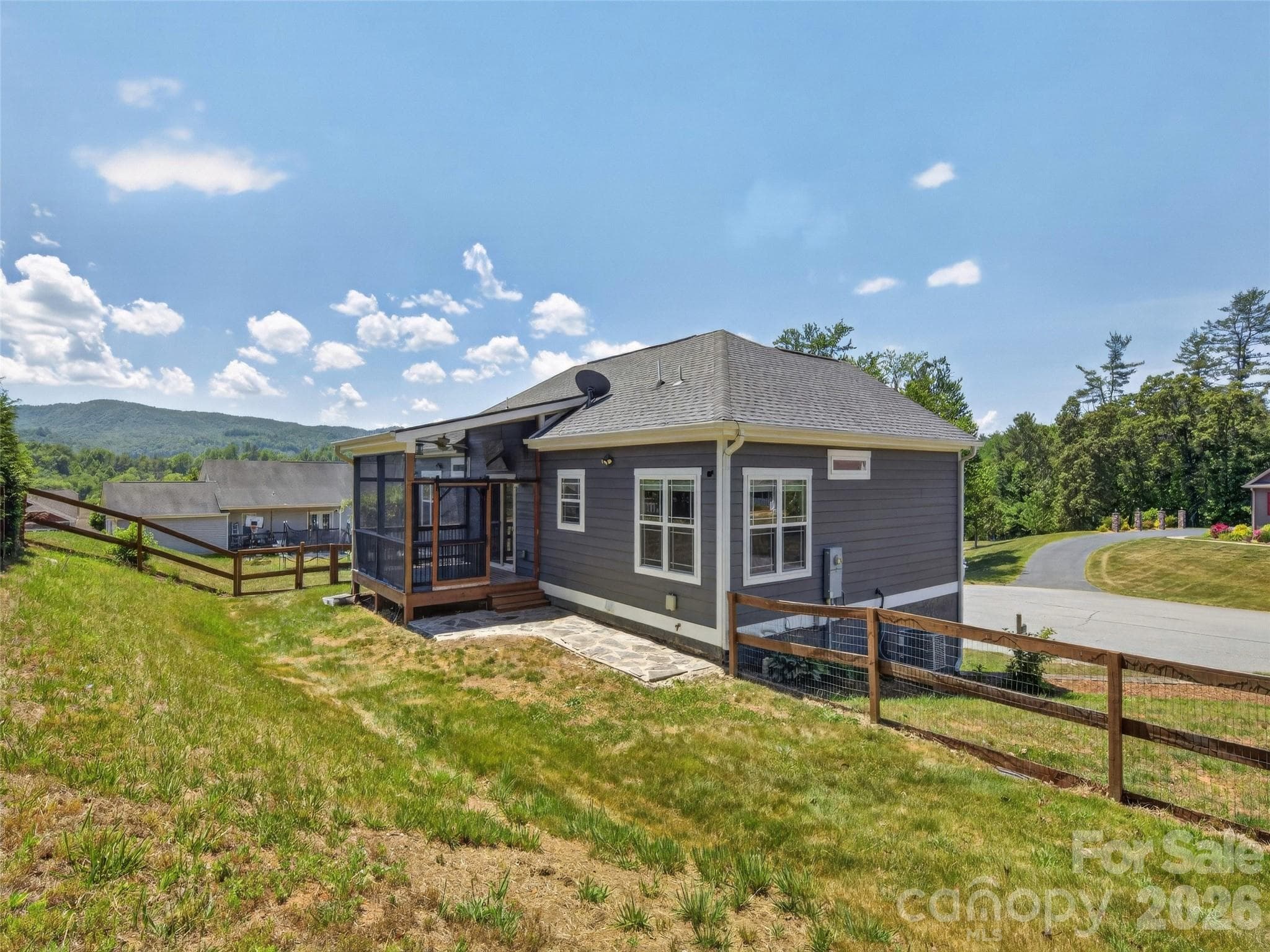 Fenced in back yard with stone patio - 133 Asher Lane, Etowah