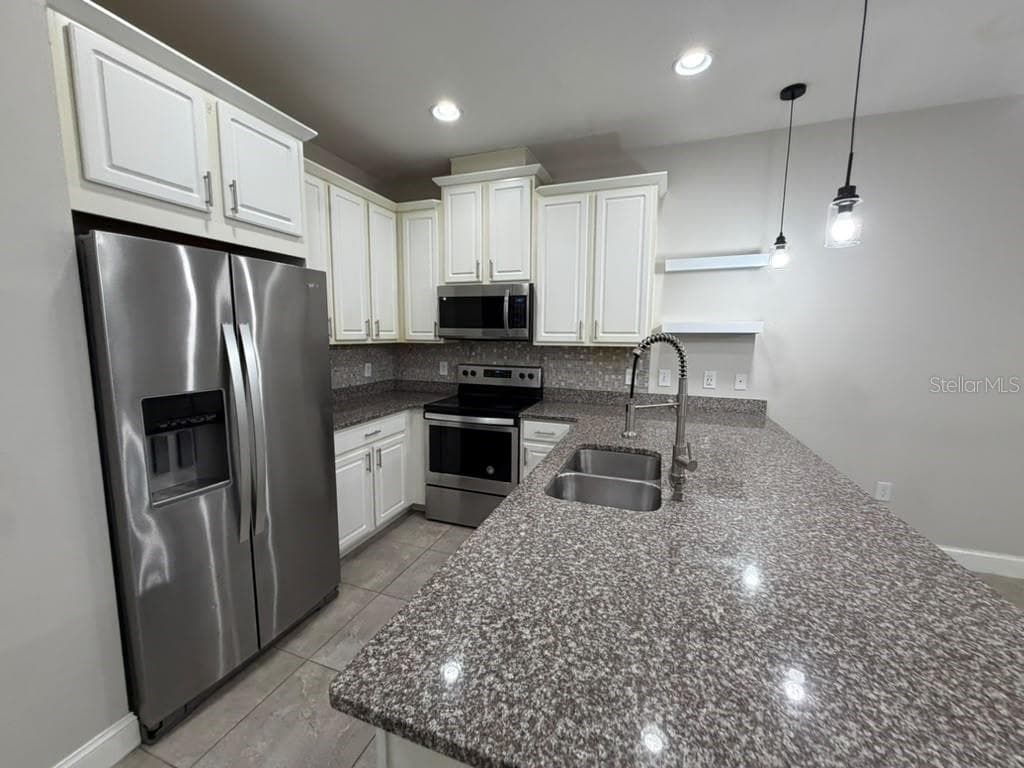 Townhouse at 2613 PLAY HARD ALLEY, KISSIMMEE, photo 5 of 27