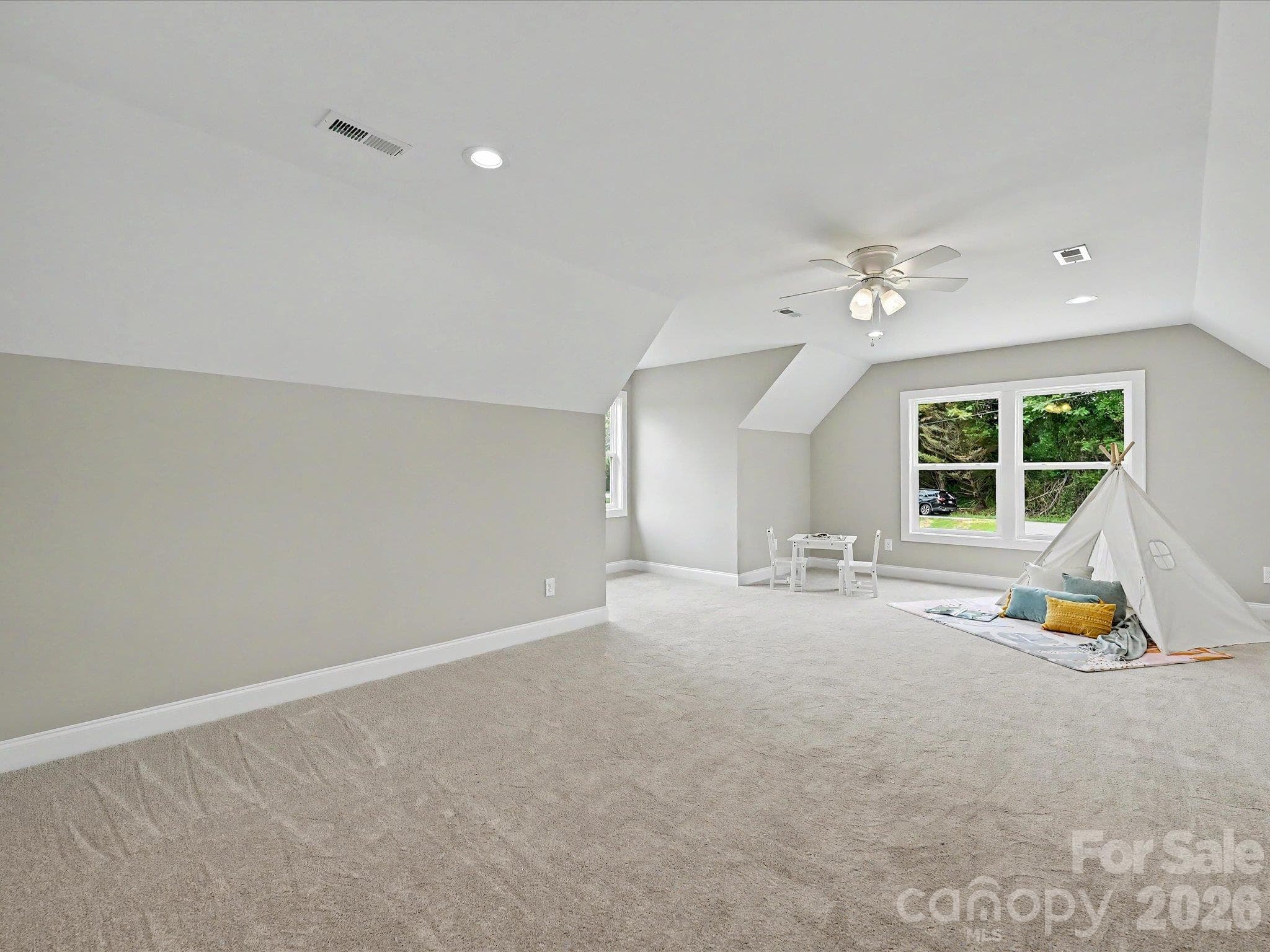 Spacious bonus room offers endless flexibility for a media room, playroom, home gym or additional living space. - 159 Lone Pine Road, Statesville