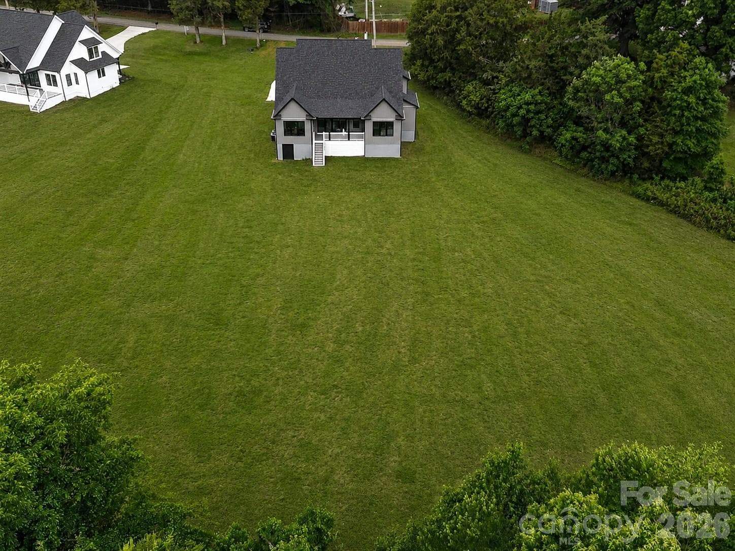 Concept Grass - Enjoy the privacy & space of this expansive 2-acre homesite & large open backyard bordered by mature trees. - 159 Lone Pine Road, Statesville