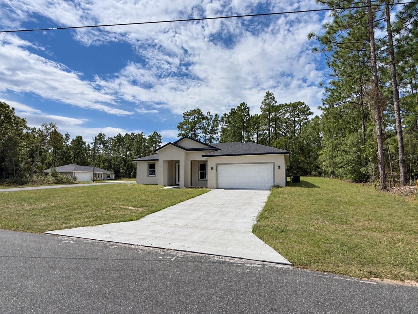 Single Family Residence at 9500 N CHERRY LAKE DR, DUNNELLON, photo 2 of 28