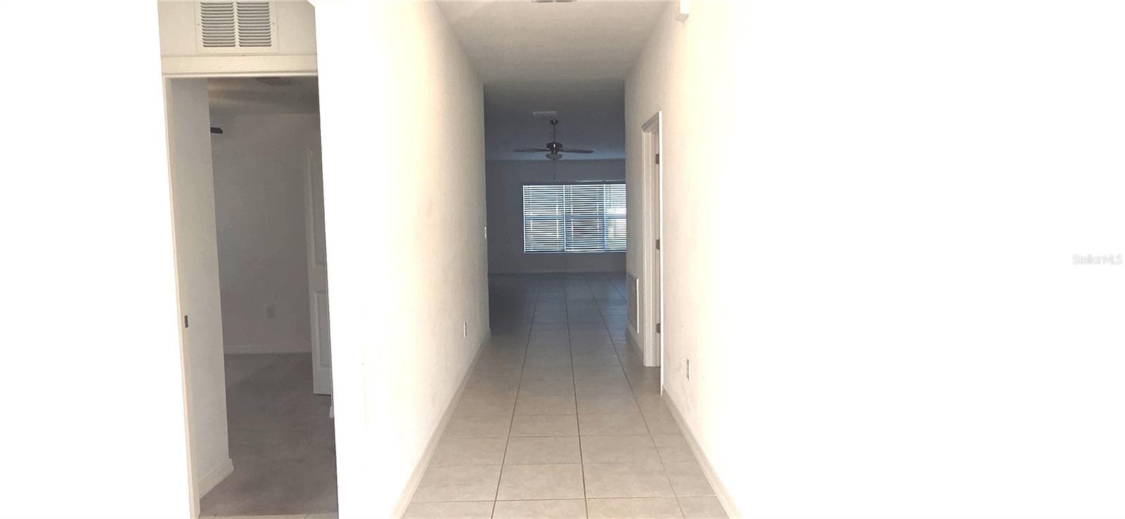 Hallway from Front Door to Kitchen/Great Room - 3947 RESTING ROBIN AVE, BARTOW
