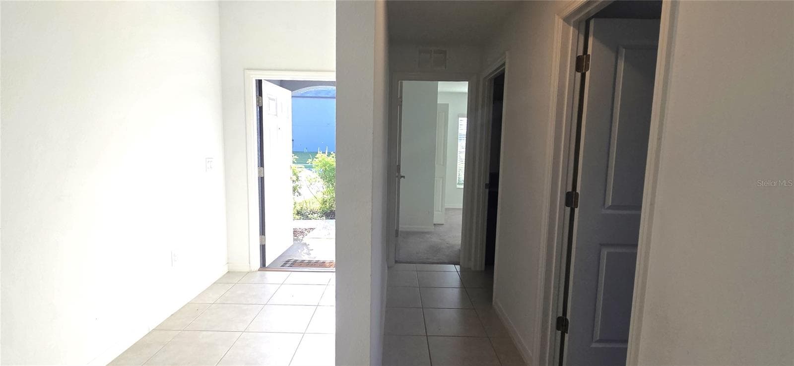 Hallway to Bedrooms and Bathroom 2 - 3947 RESTING ROBIN AVE, BARTOW