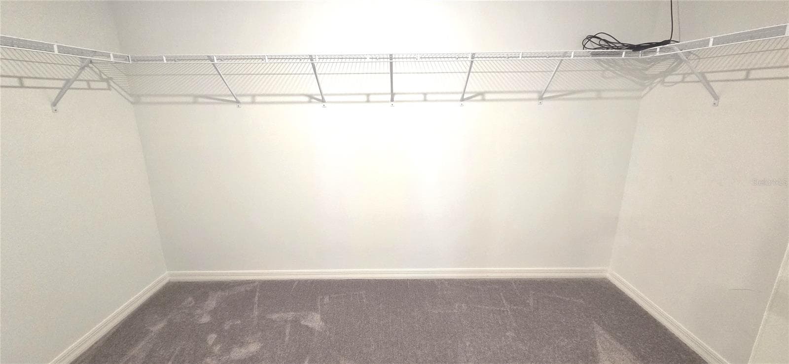Primary Bedroom Walk-in Closet - 3947 RESTING ROBIN AVE, BARTOW