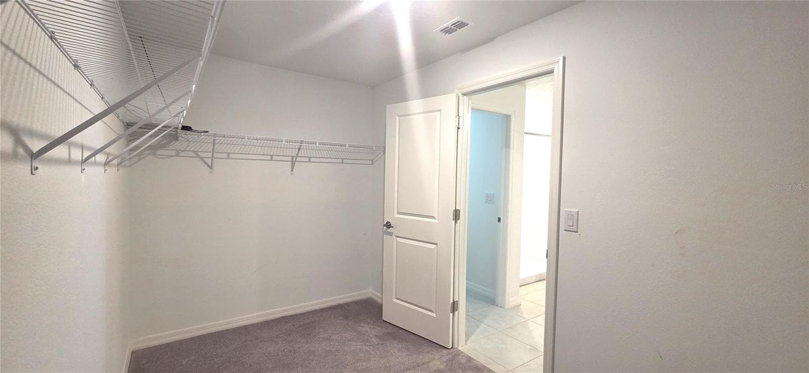 Primary Bedroom Walk-in Closet - 3947 RESTING ROBIN AVE, BARTOW