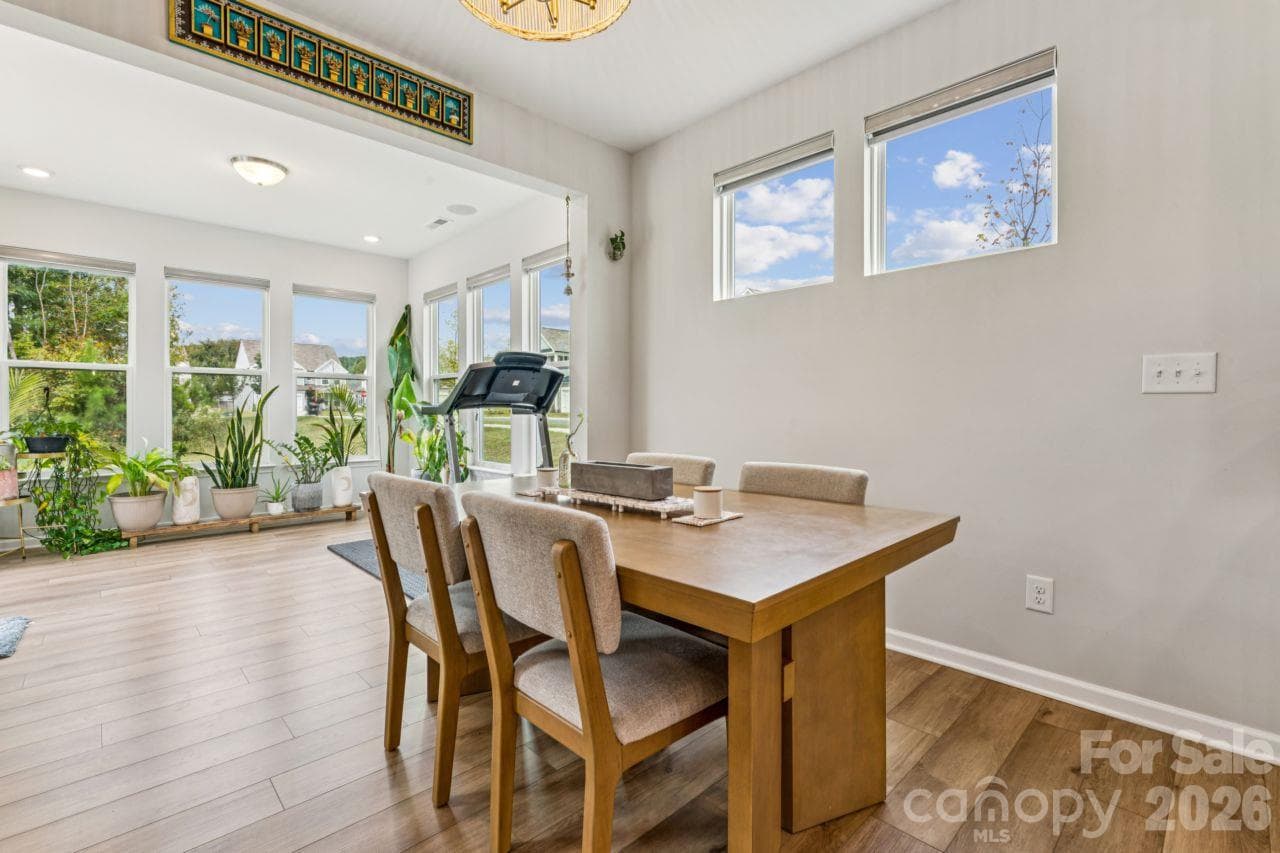 Breakfast nook into sunroom - 8704 Frank Grier Road, Charlotte