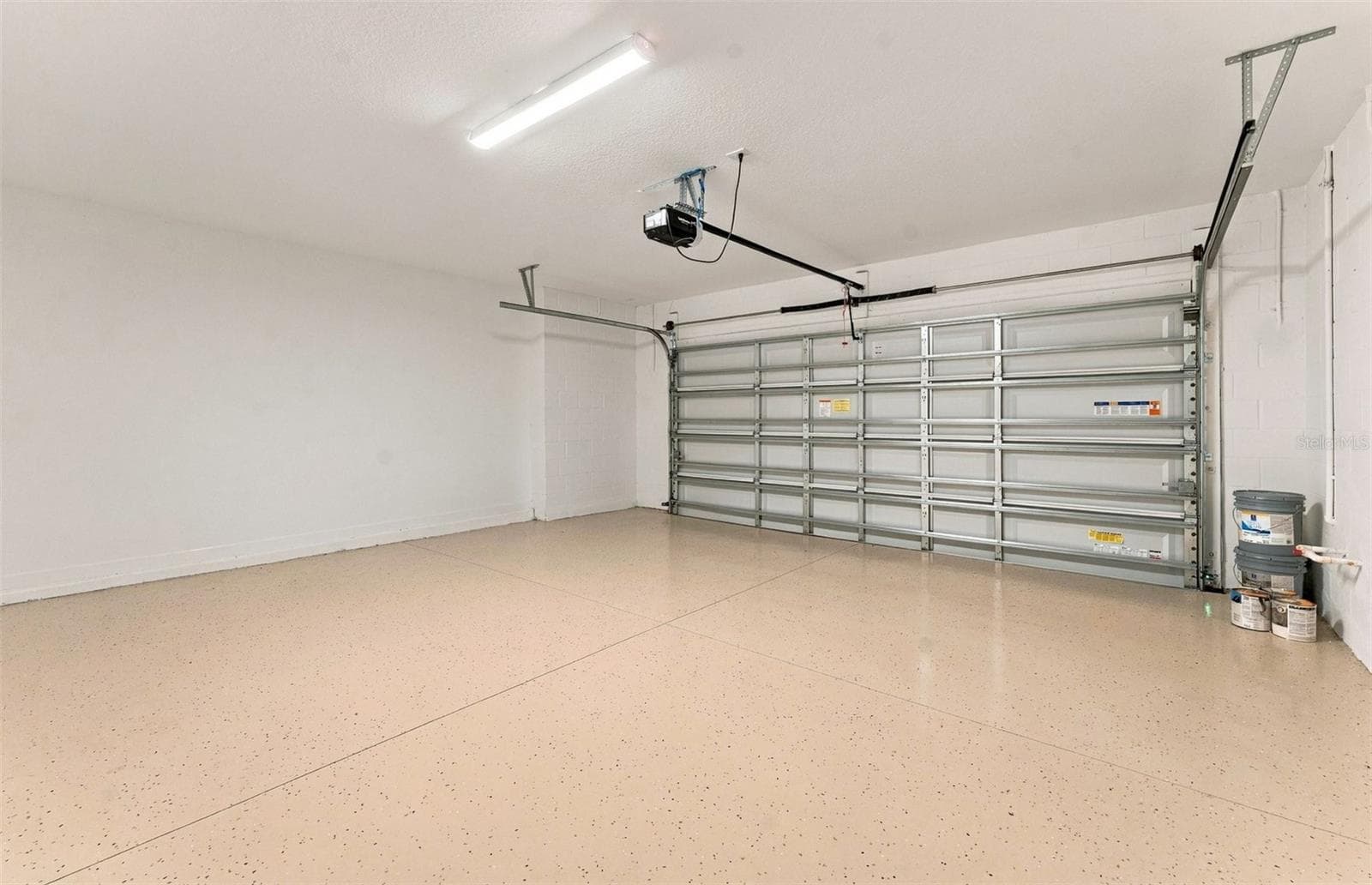 2-Car Garage w/Epoxy Flooring - 1391 ALLAGASH DR, ZEPHYRHILLS