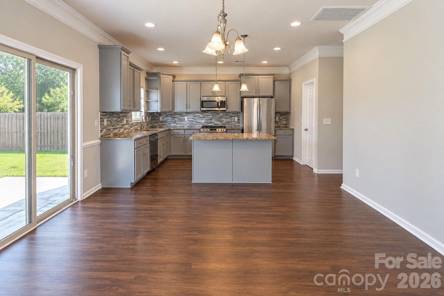 View of Breakfast room and Kitchen from Living room - 7041 Carnwarth Lane, Indian Land