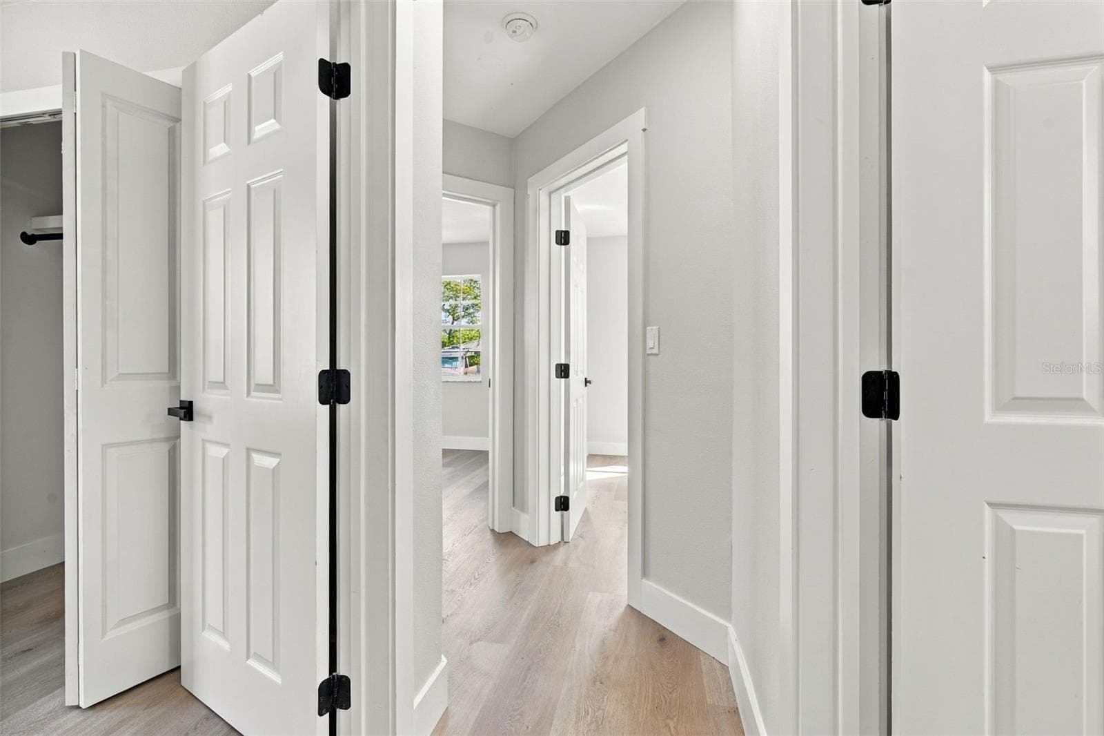 Hallway - view from Primary Bedroom - 1321 FOUNTAINHEAD DR, DELTONA