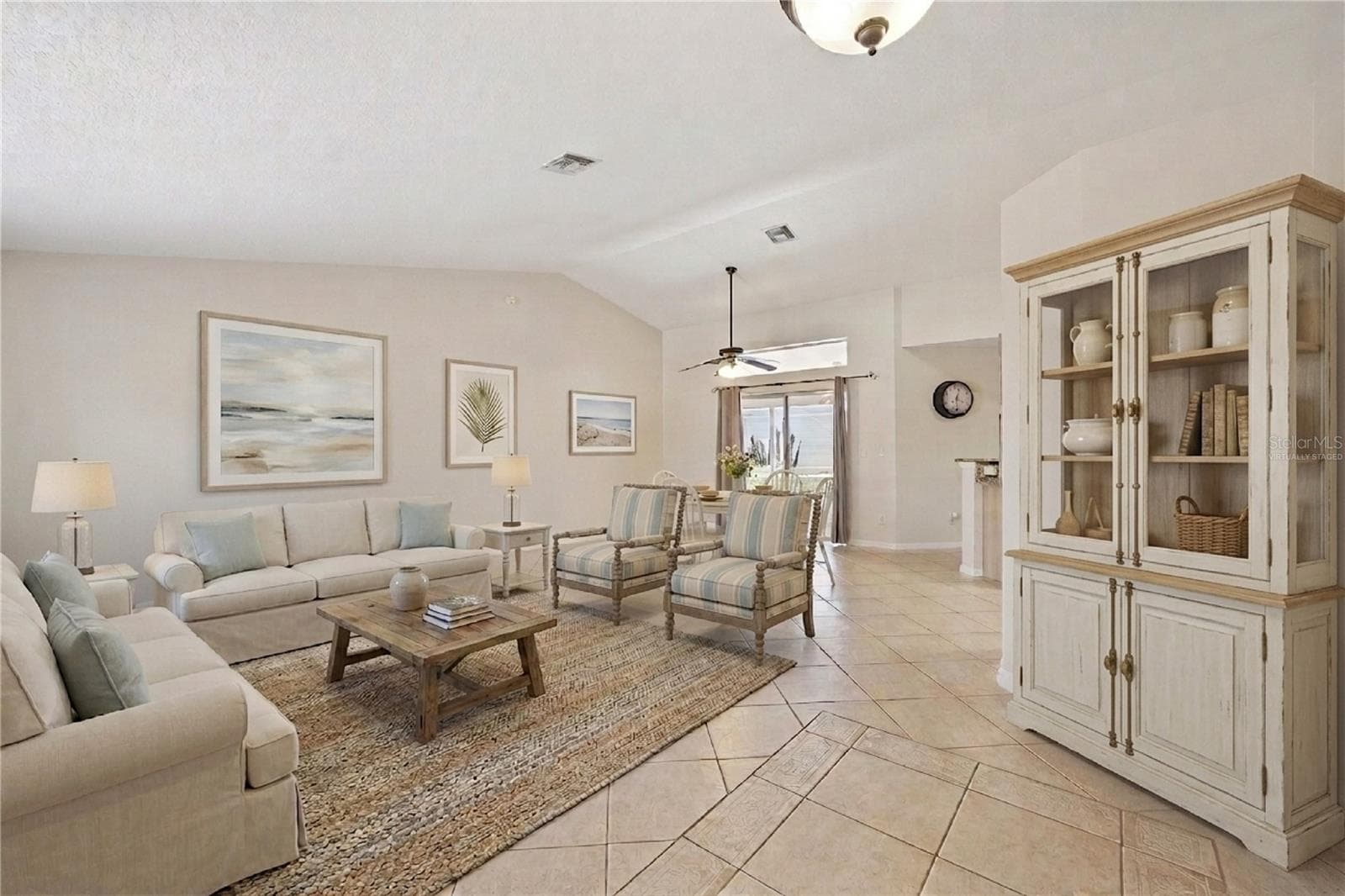 Virtually Staged foyer, formal living and dining - 21101 BRAVEHEART DR, LEESBURG