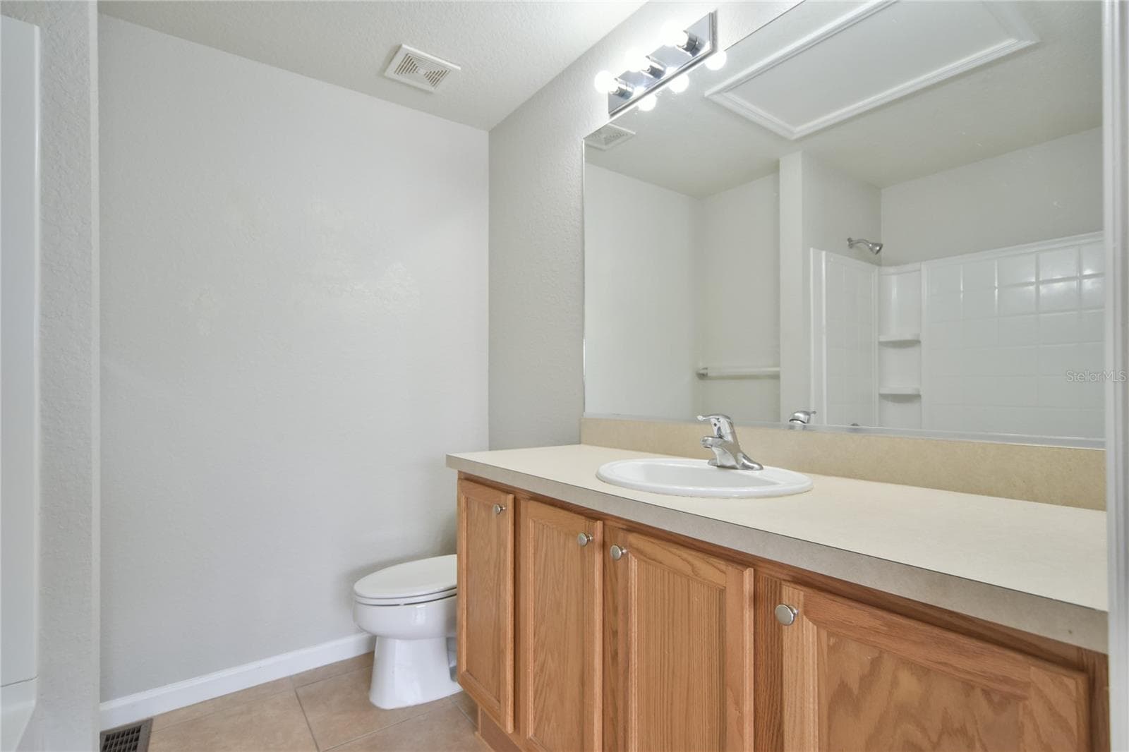 back bedroom ensuite bathroom 2nd floor - 4490 SW 49TH AVE, OCALA