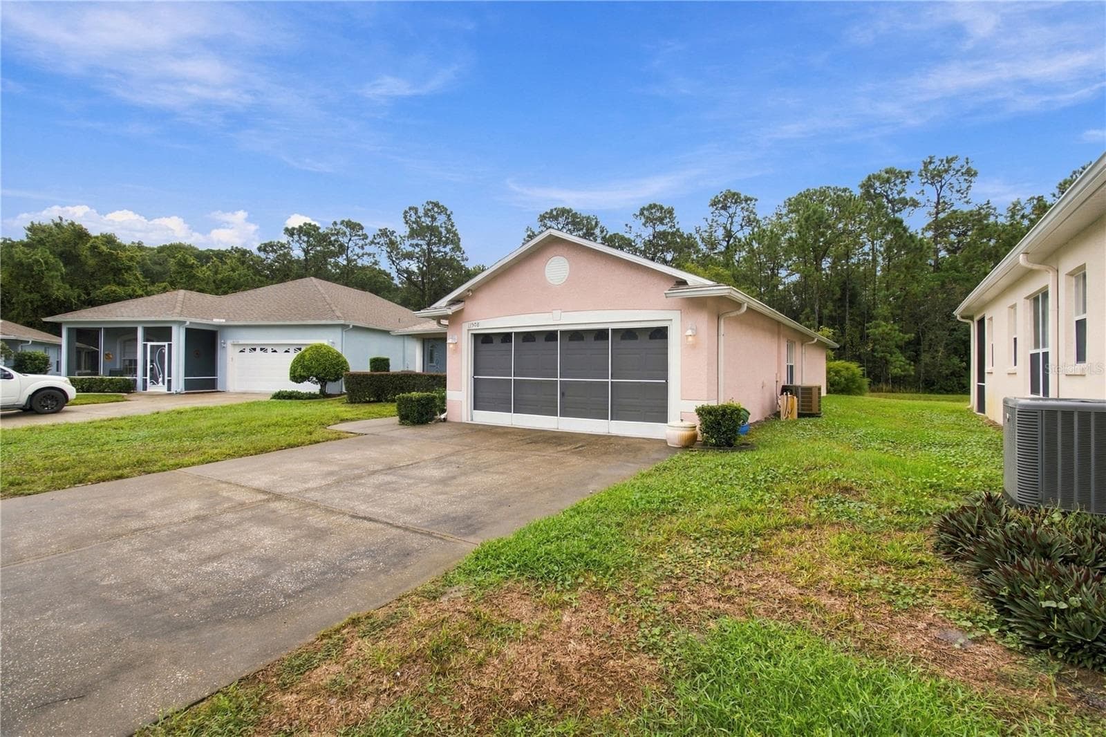 Single Family Residence at 11508 BLOOMINGTON CT, NEW PORT RICHEY, photo 2 of 90